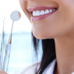 doctor holding dentist s tools