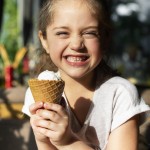 close up happy girl with ice cream