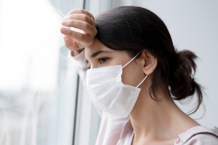 woman wearing face mask during home
