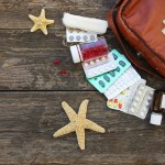 first aid kit old wooden background 1